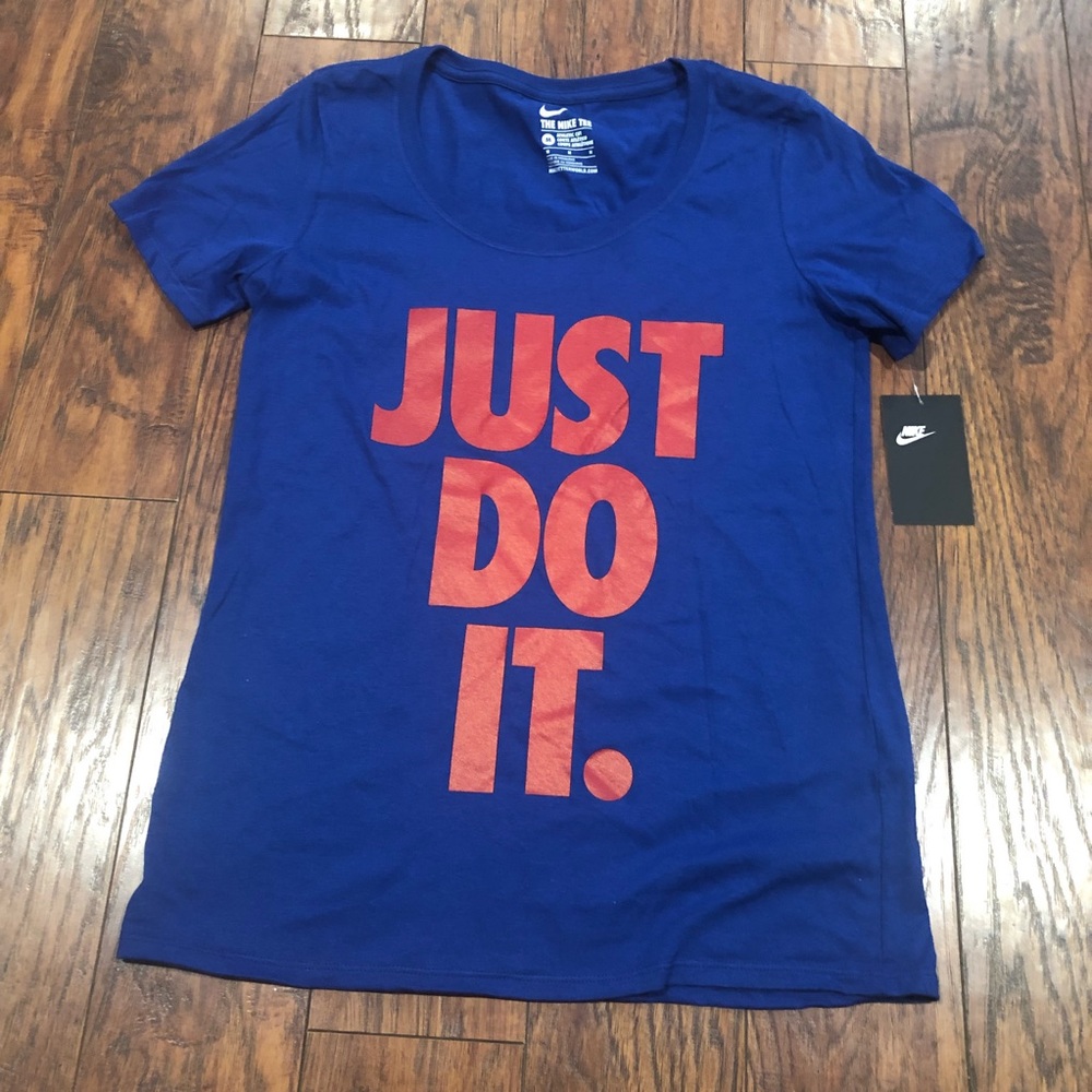 Blue nike T-shirt with red lettering